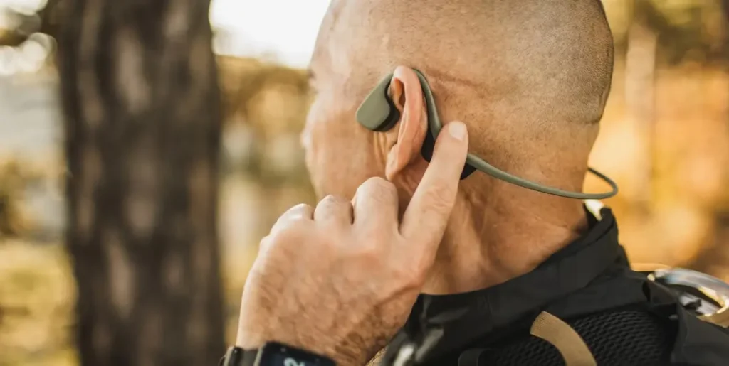 Athlete wearing bone conduction headphones